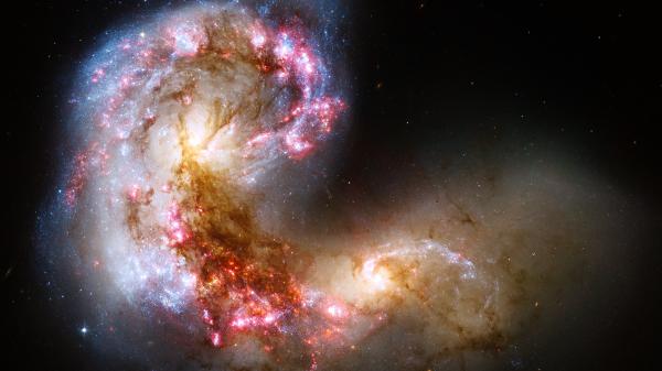 Zwei Galaxien vereinigen sich.